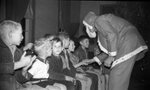 Man in Santa Claus Costume with Children by Fred A. Blocker