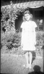 Girl in front of House by Fred A. Blocker