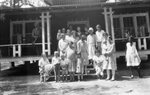 Family Posing on Porch by Fred A. Blocker