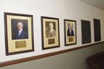 Framed photographs of E. R. Lloyd, J. R. Ricks, and Vance Watson