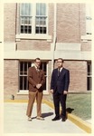 Professor and Student outside of building